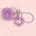 🌸💜 Blush Petal Pom Phone Charm - Glow in the Dark